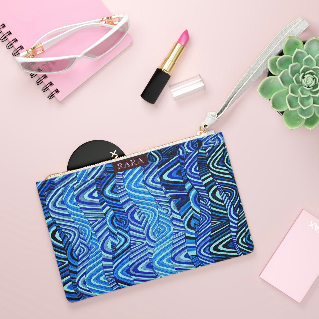 icy blue waves print clutch bag