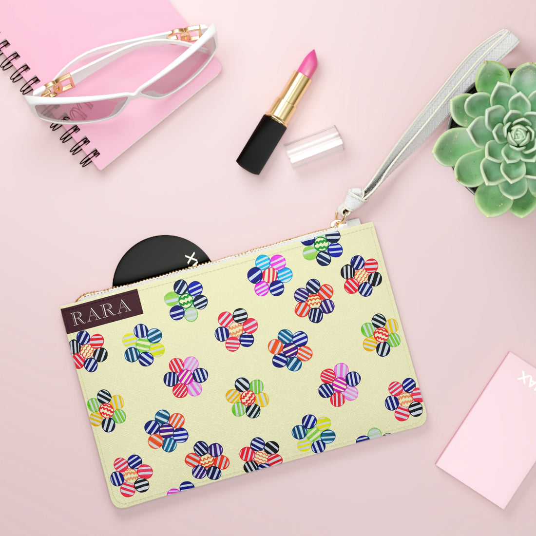 cream geometric striped floral clutch bag