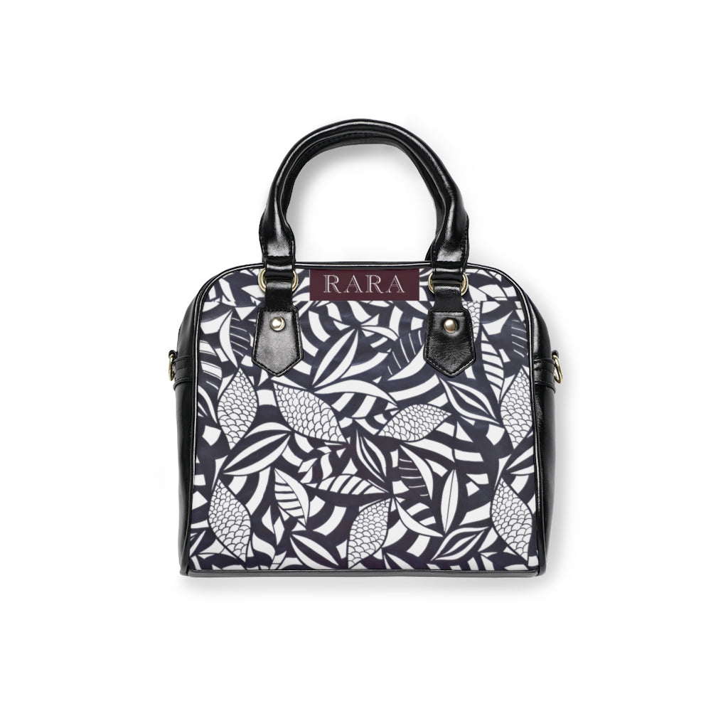 white tropical print handbag