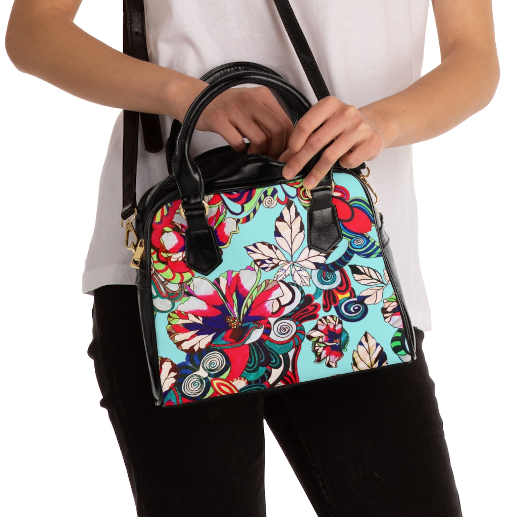 icy blue graphic floral handbag