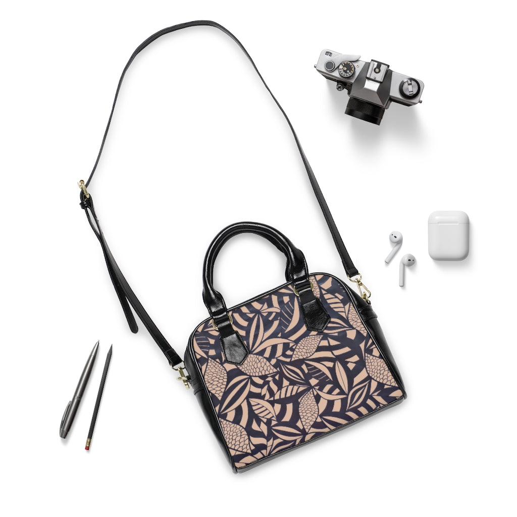 nude tropical print handbag