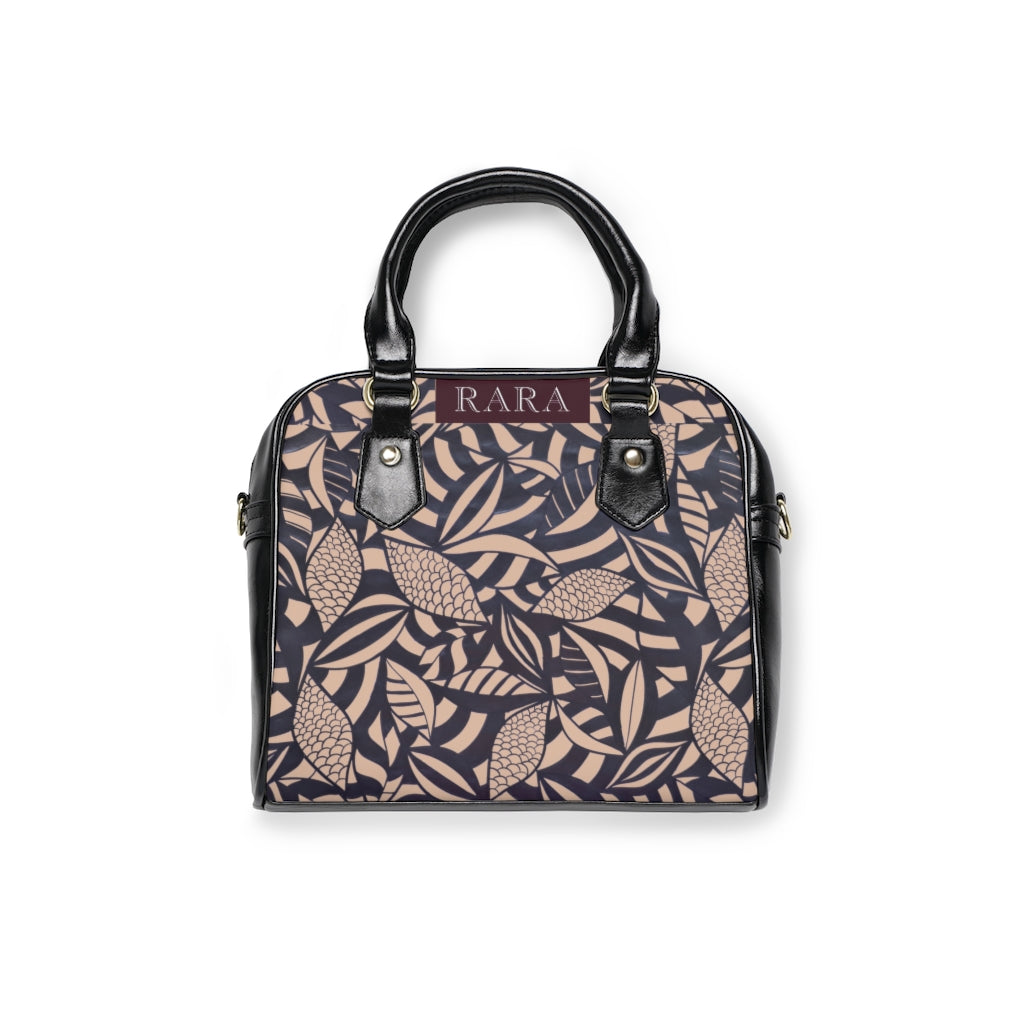 nude tropical print handbag