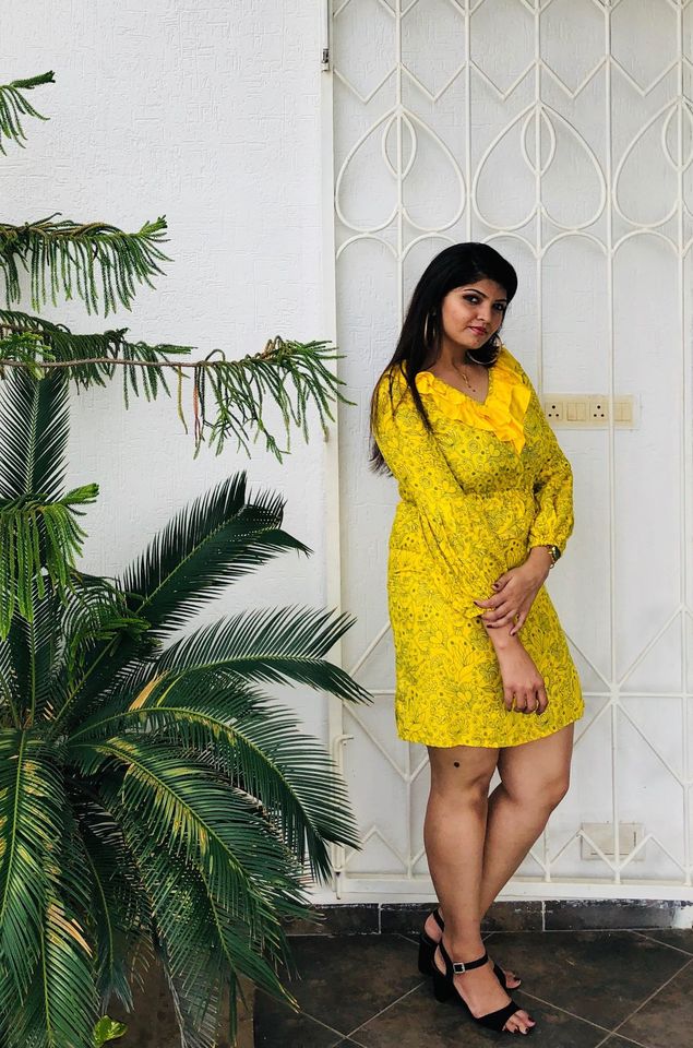 Yellow screen printed dress with neck ruffles, elastic waist & pleated sleeves