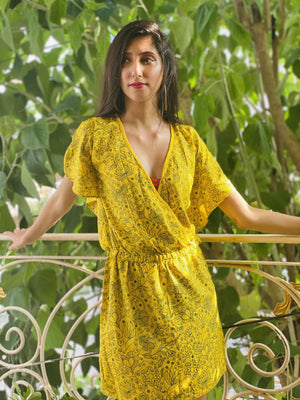 Canary yellow kaftan sleeve dress with bottle green floral screen print