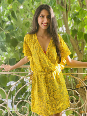 Canary yellow kaftan sleeve dress with bottle green floral screen print