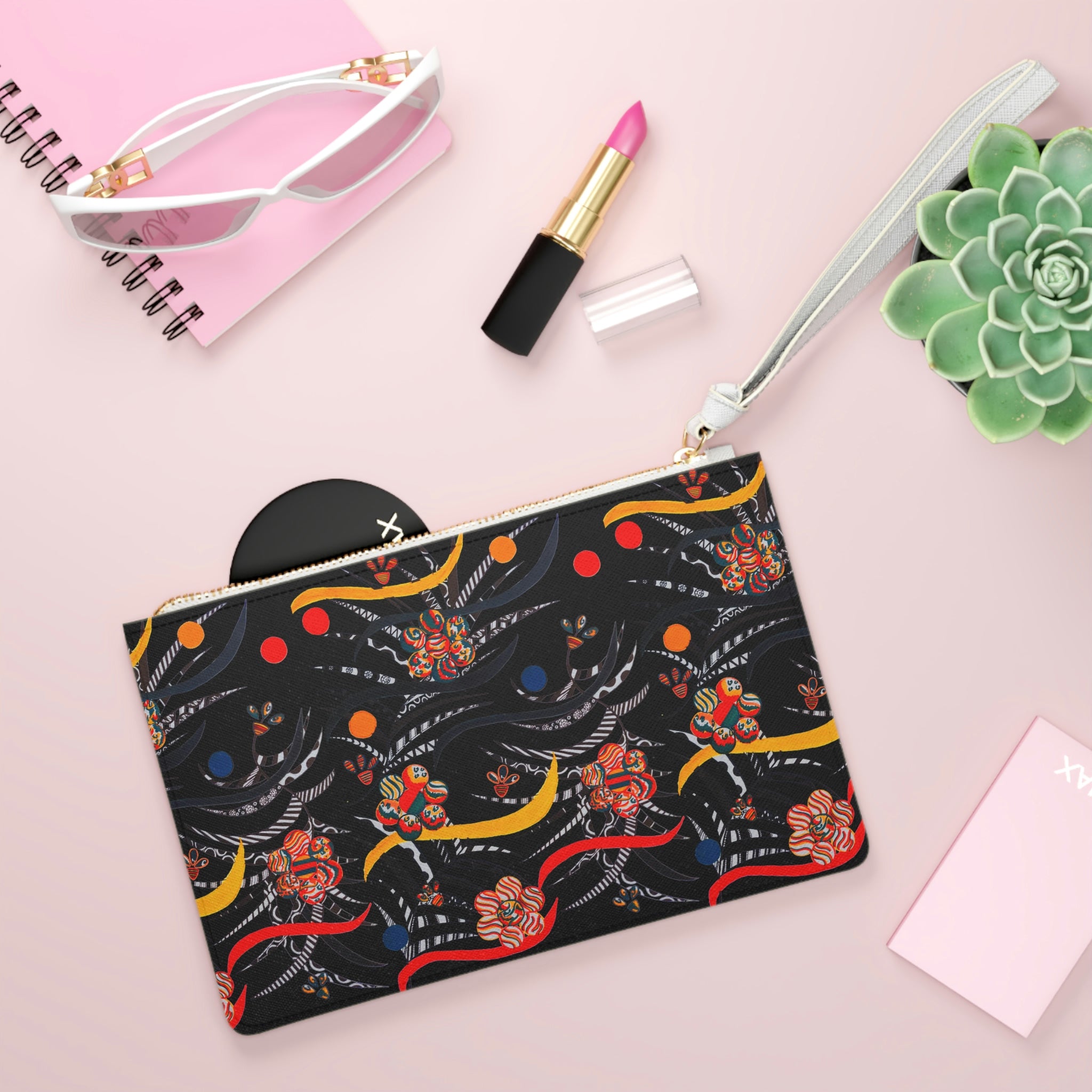 black floral & animal print clutch bag