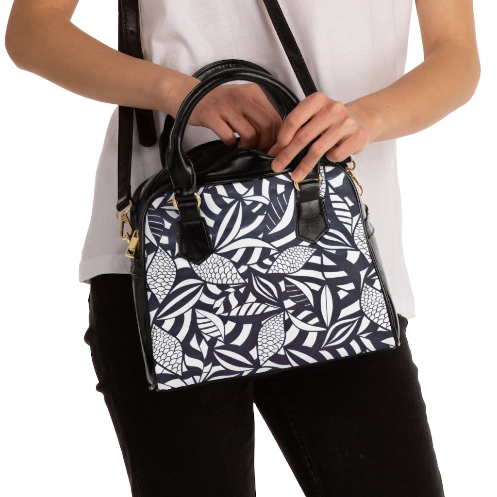 white tropical print handbag