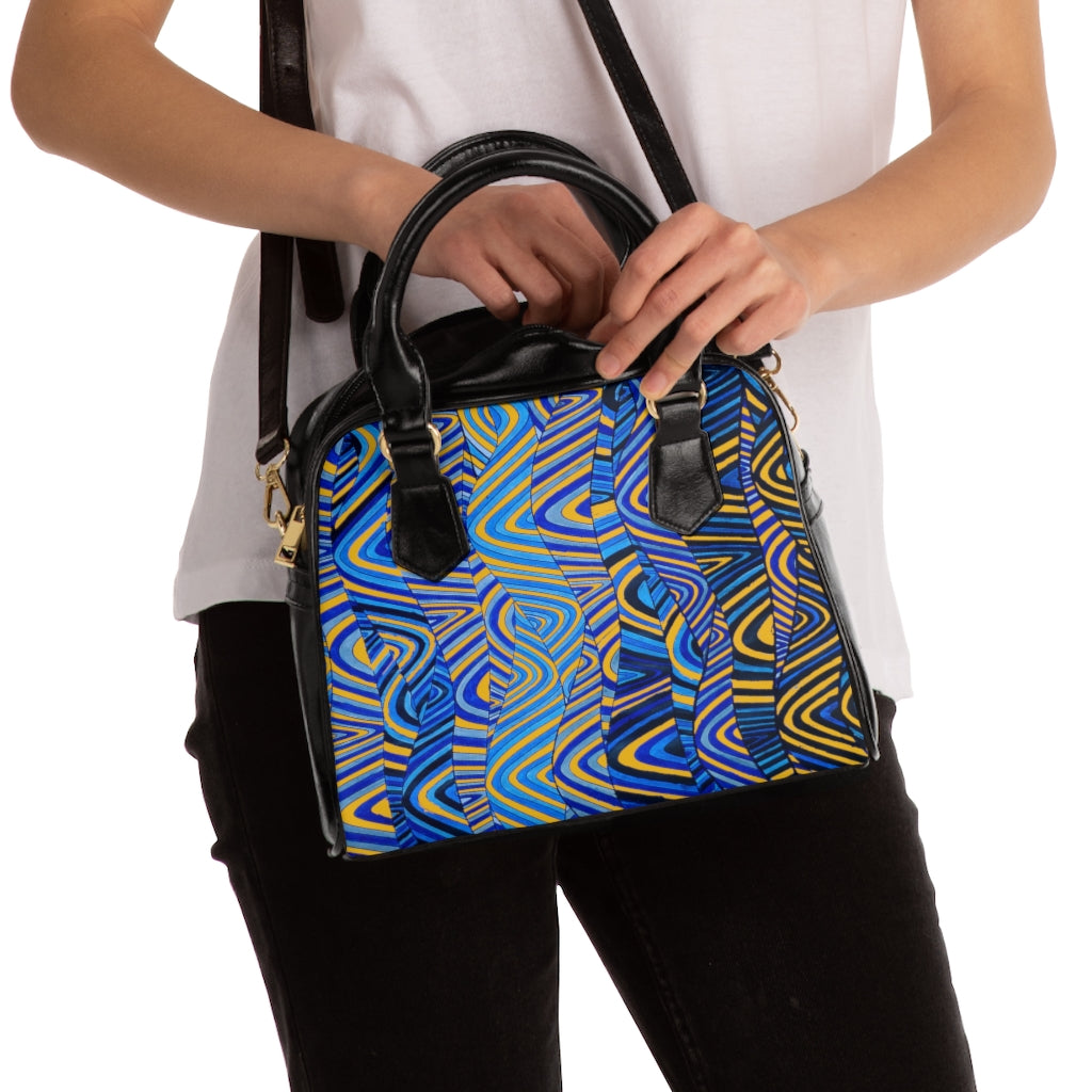 yellow psychedelic print handbag