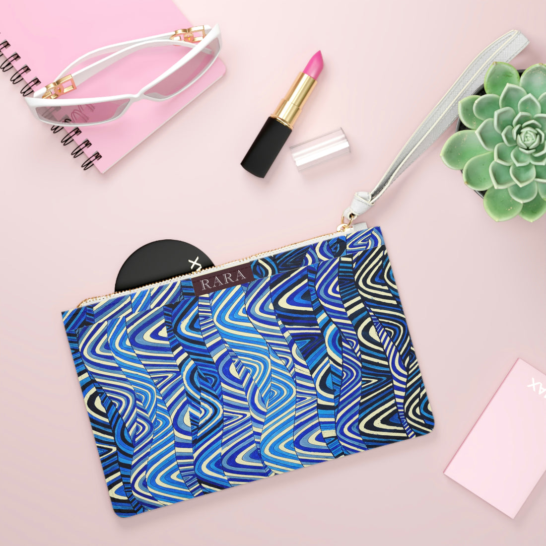 cream waves print clutch bag