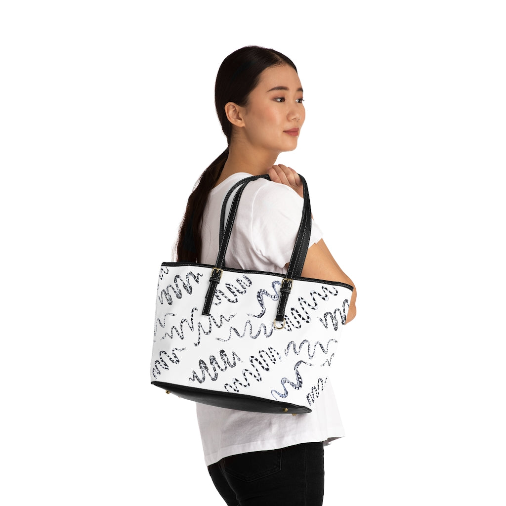 white snake print handbag