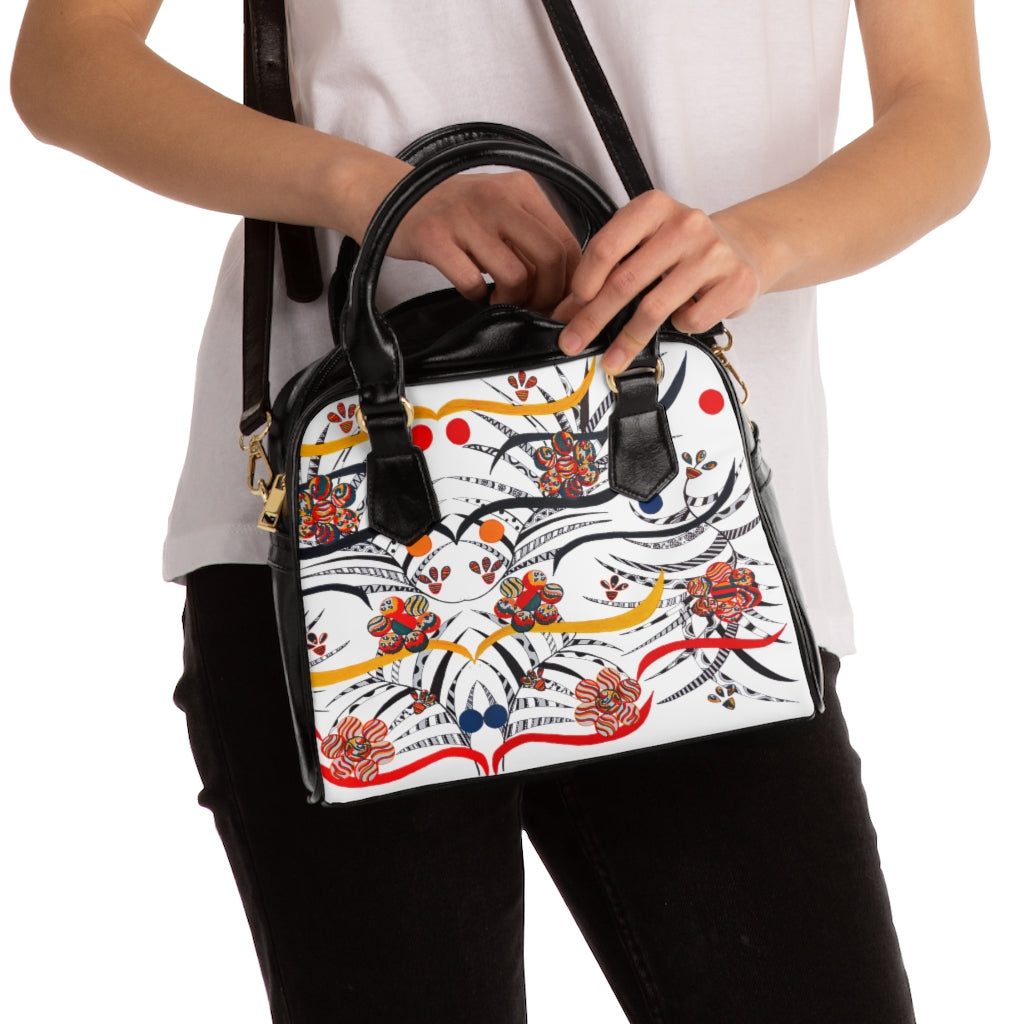 white animal & jungle print handbag