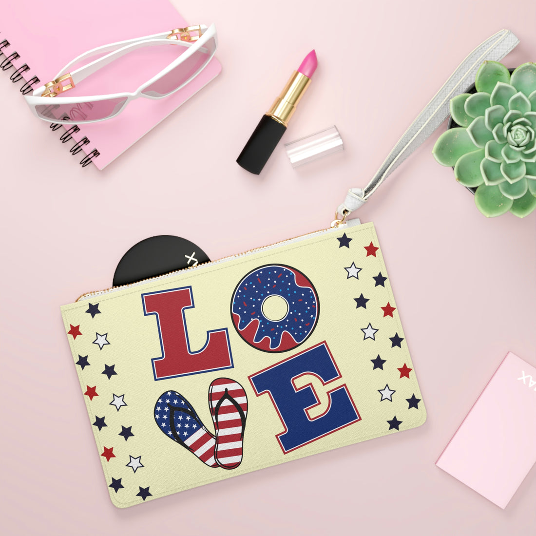 cream love typography print clutch bag