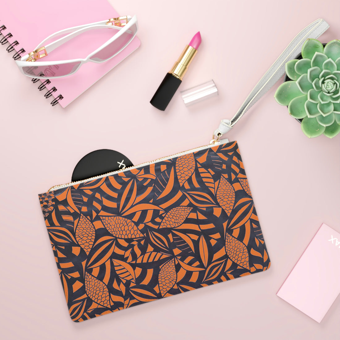 peach tropical leaves print clutch bag