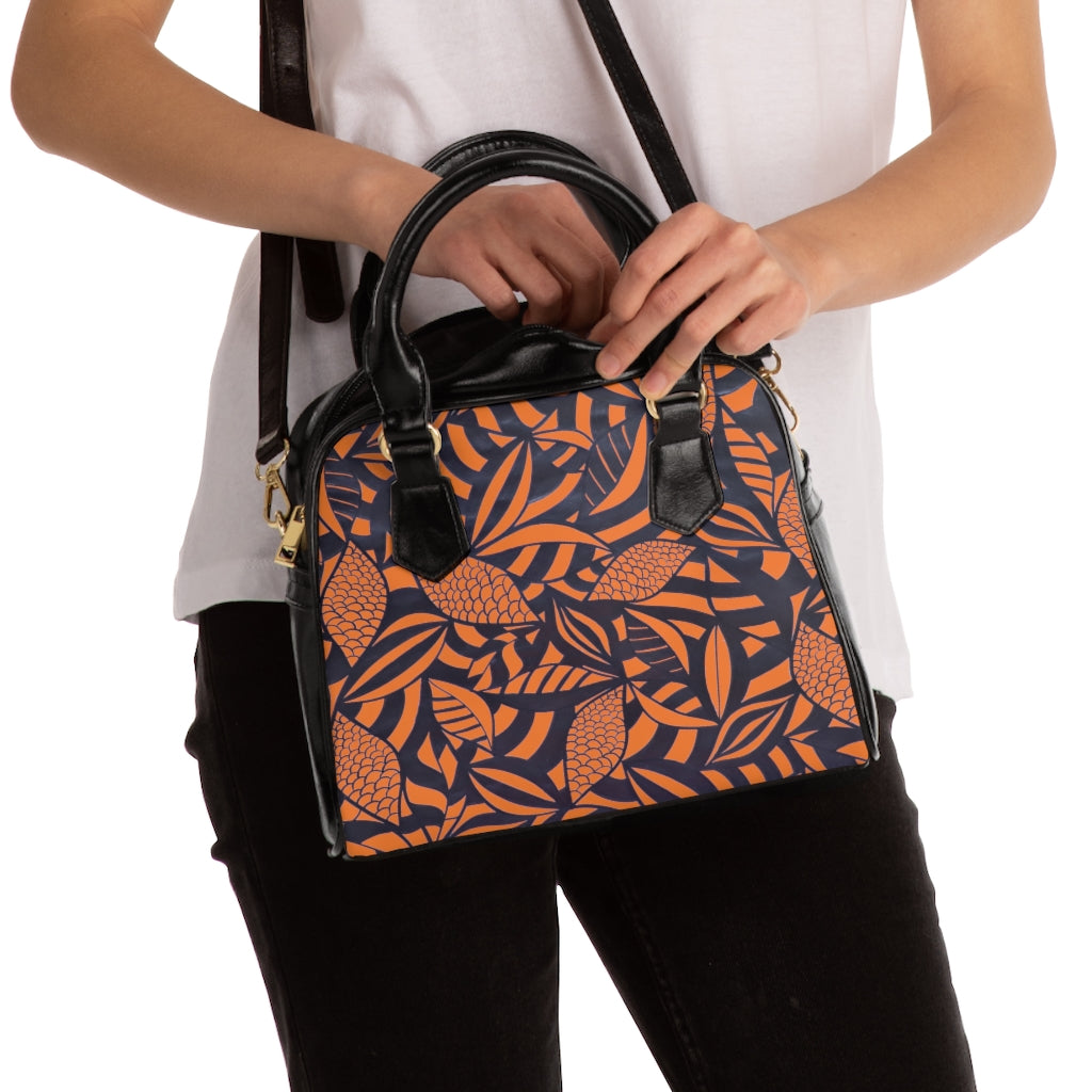 peach tropical print handbag