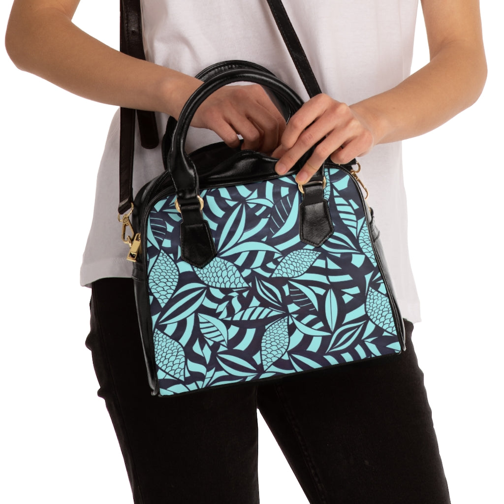 icy blue tropical print handbag