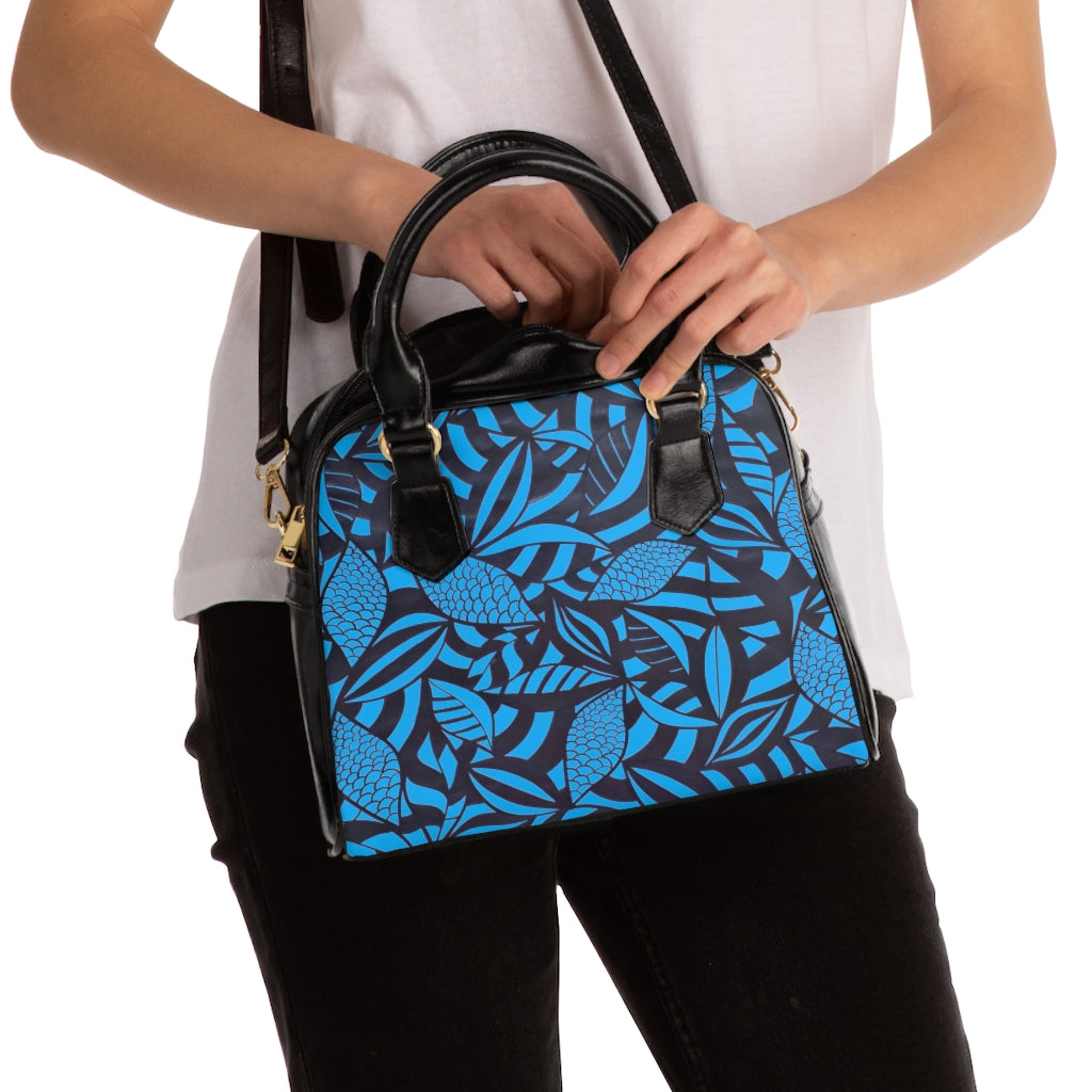 qua blue tropical print handbag