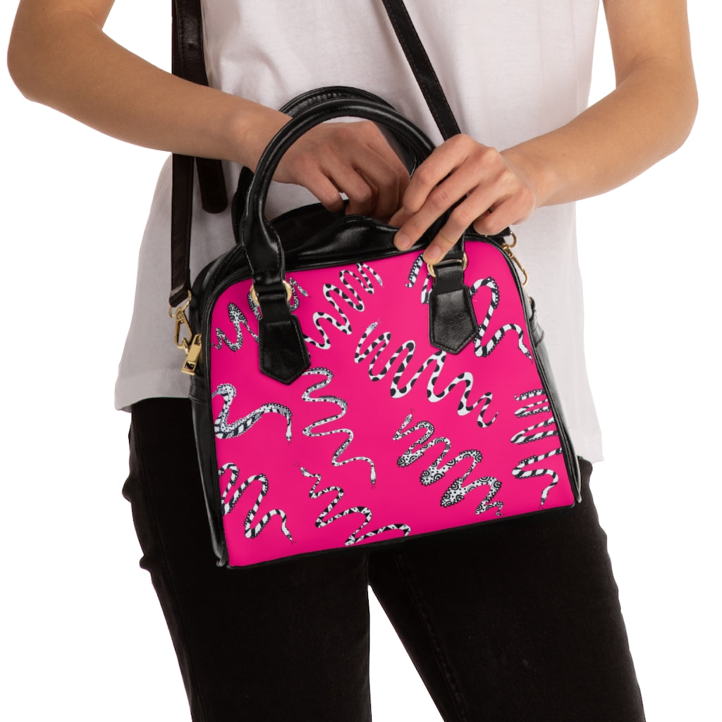 hot pink snake print handbag