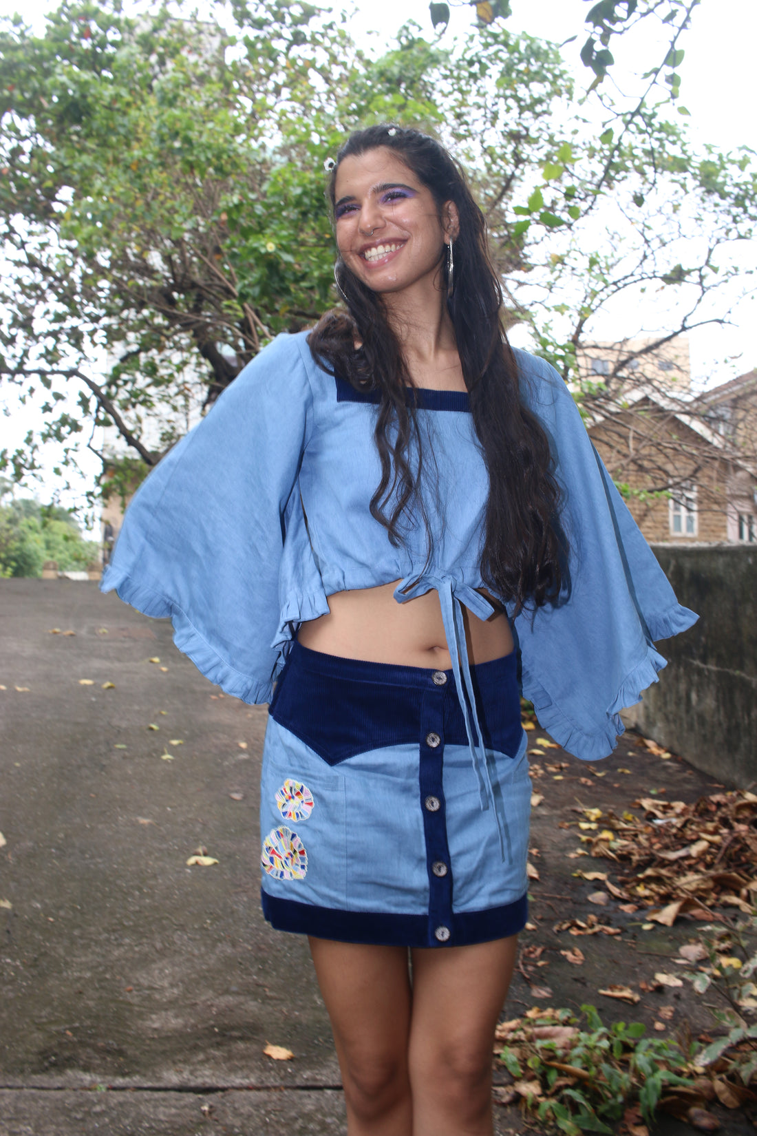 Ethical floral embroidered cotton denim skirt with center front plack & courdroy yoke & crop top set with drawstring waist & flared sleeves