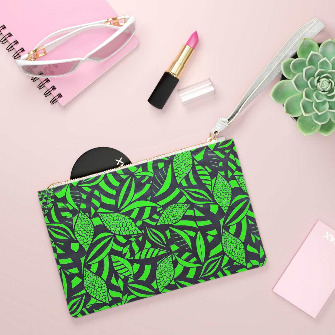 neon green monochrome tropical leaves print clutch bag