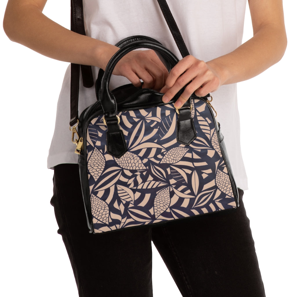 nude tropical print handbag