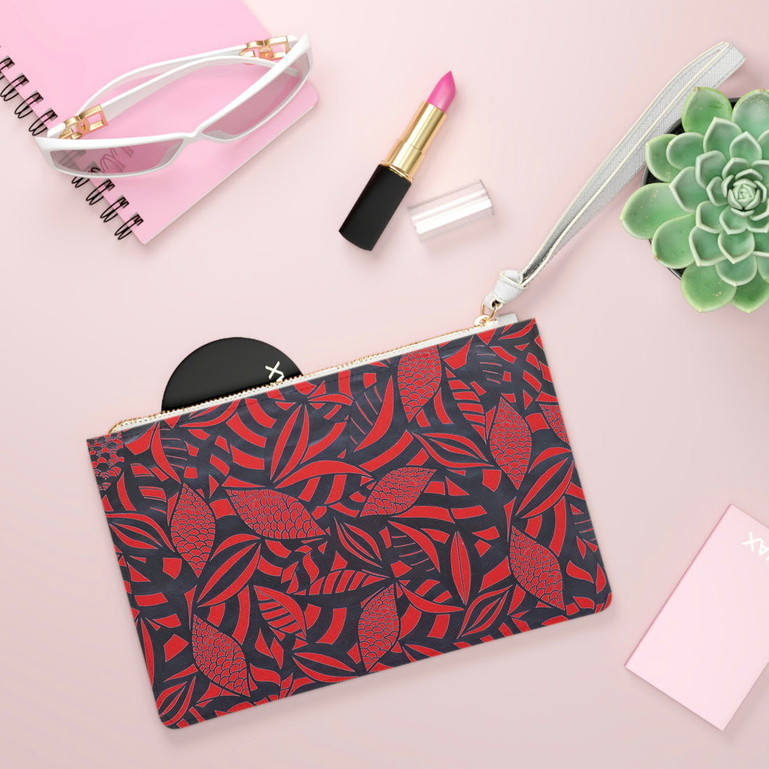 red tropical print clutch bag