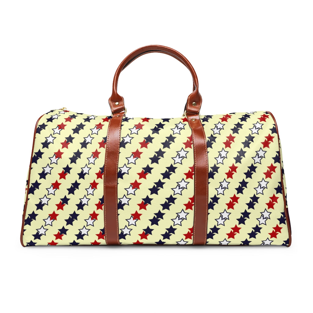 cream star print travel bag