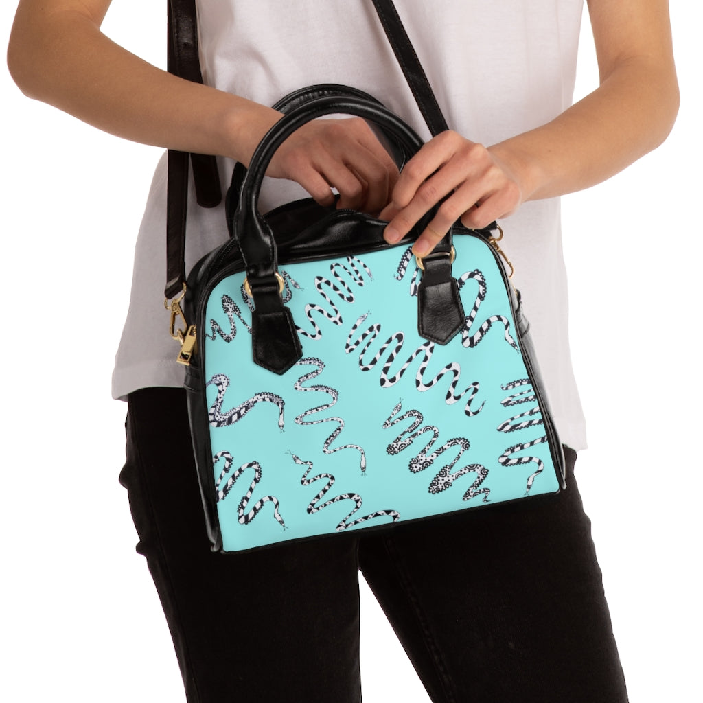 icy blue snake print handbag