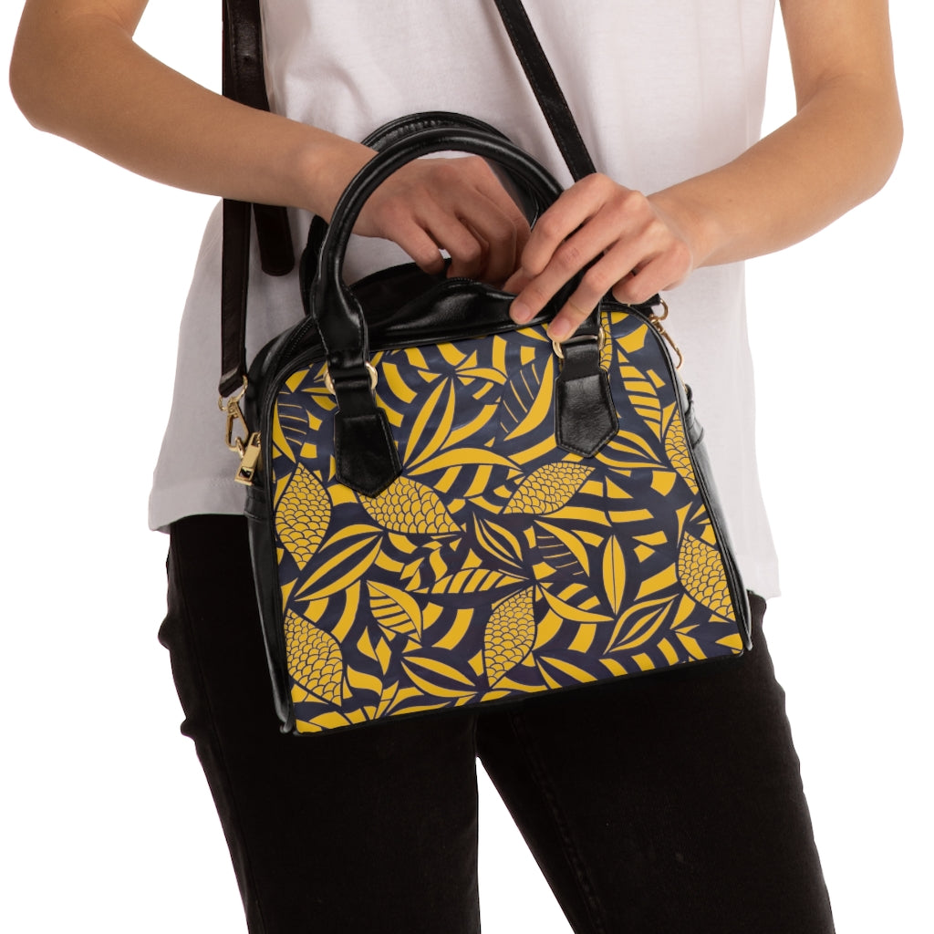 yellow tropical print handbag